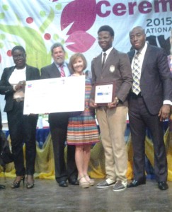Overall winner, Ukaegbu Christopher (4th from left) flanked by (L-R) representative of the National Petroleum Investment Management Services (NAPIMS), CNL Director of Gas Mr. Steve Freeman, Wife of CNL CEO, Mrs Neff and the winner's teacher