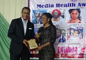 National Mirror Health Correspondent, Franka Osakwe receiving her award for the best newspaper health reporting.