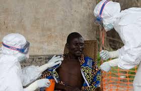  • An Ebola patient receiving medical attention 